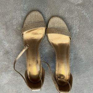 Gold litter heels worn once